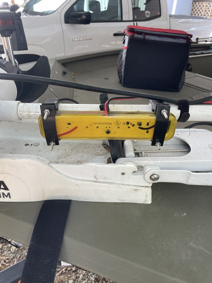 Mounted on trolling motor shaft, can use just ty wraps.